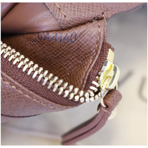 LOUIS VUITTON Insolite Monogram Canvas Wallet Brown