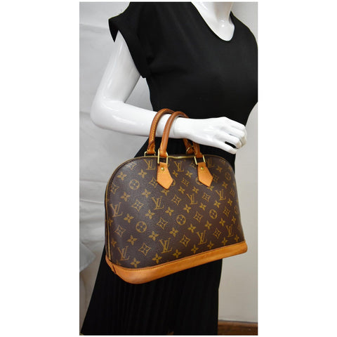 LOUIS VUITTON Alma Monogram Canvas Satchel Bag Brown