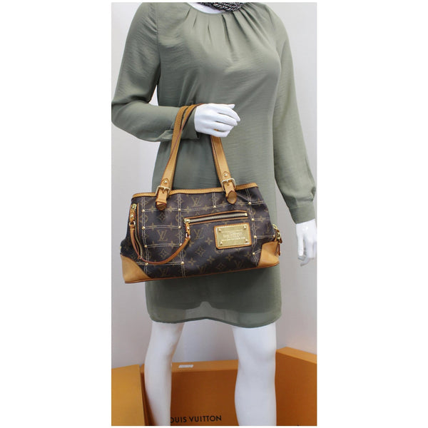 Louis Vuitton Riveting Monogram Canvas Hand Bag
