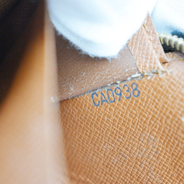 LOUIS VUITTON Monogram Canvas Zippy Wallet Brown