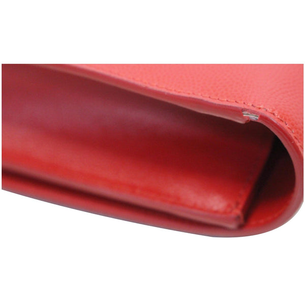 YVES SAINT LAURENT Cassandre Grain De Poudre Clutch Red