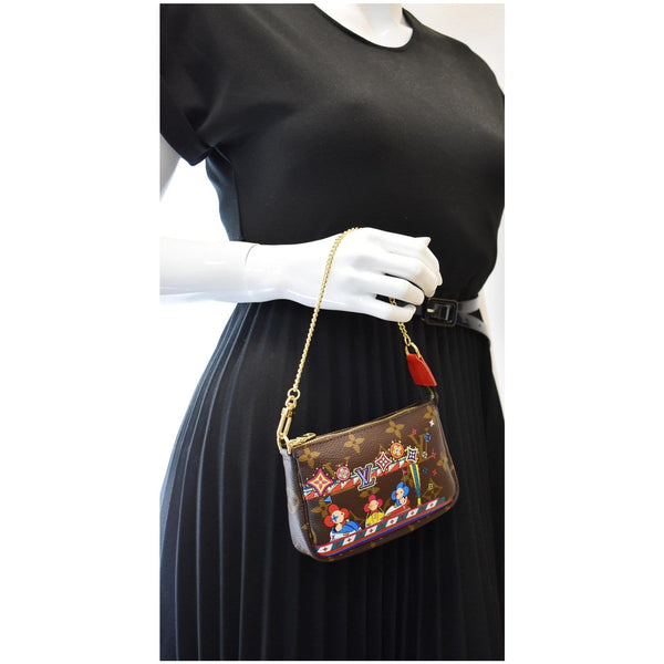 LOUIS VUITTON Mini Pochette Christmas Monogram Canvas Accessoires Pouch Brown