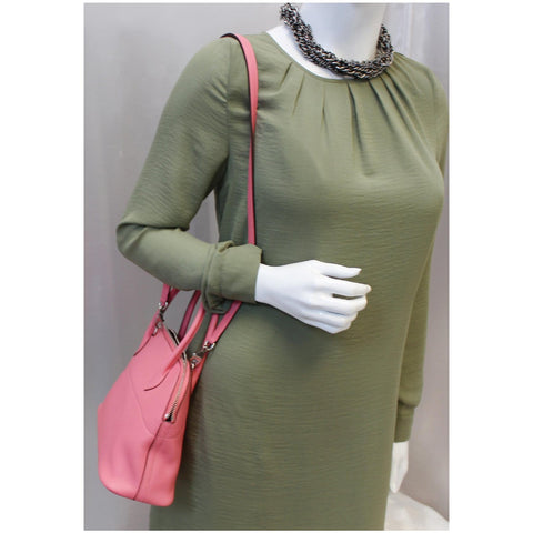 Women holding Hermes Bolide 27 Swift Calfskin Bag