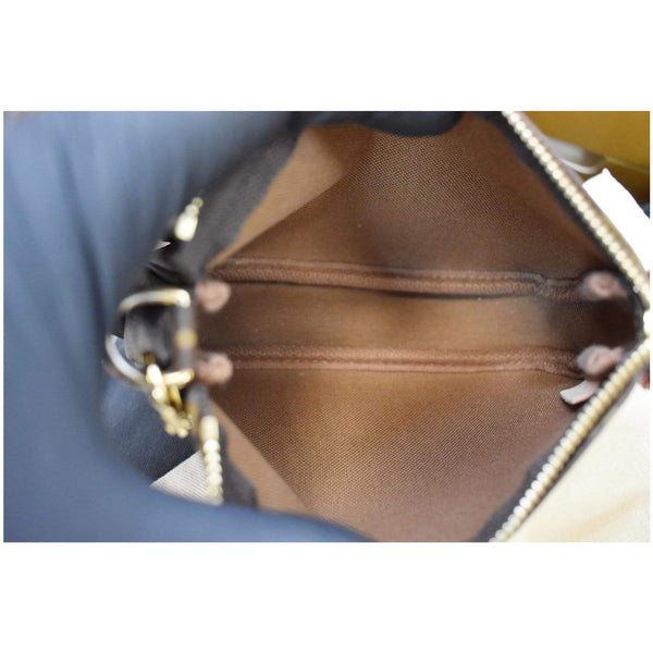 Louis Vuitton Mini Pochette Monogram Canvas Pouch - interior view