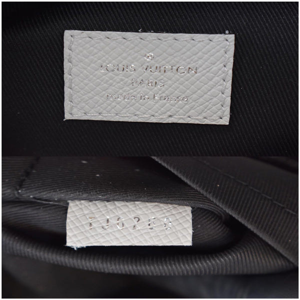 LOUIS VUITTON Discovery PM Taiga Monogram Leather Backpack White