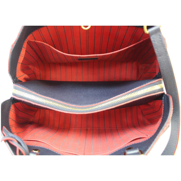 designed interior lv Montaigne MM Monogram Empreinte Bag