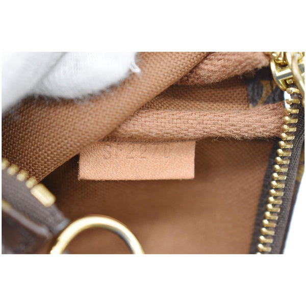 Louis Vuitton Mini Pochette Monogram Canvas Pouch code tag