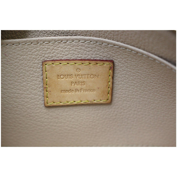 Louis Vuitton Monogram Canvas Cosmetic Pouch tags
