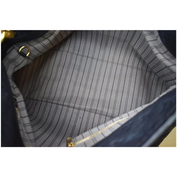 Louis Vuitton Artsy MM Empreinte Leather Shoulder Bag - elegant interior