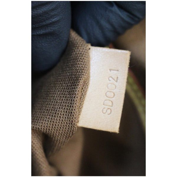 LOUIS VUITTON Alma Monogram Canvas Satchel Bag Brown