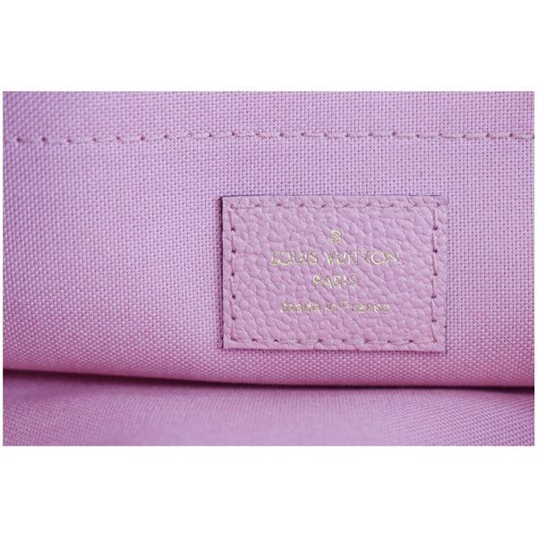 LOUIS VUITTON Daily Pouch Monogram Empreinte Leather Clutch Rose Poudre