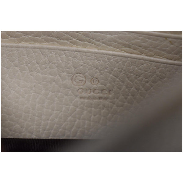GUCCI GG Interlocking Pebbled Leather Crossbody Bag Ivory 615523