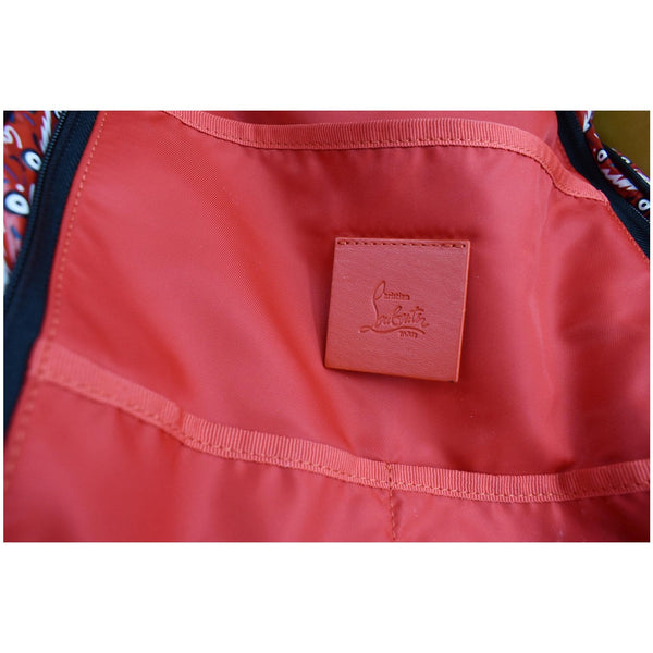 CHRISTIAN LOUBOUTIN Graphic-Print Woven Backpack Red