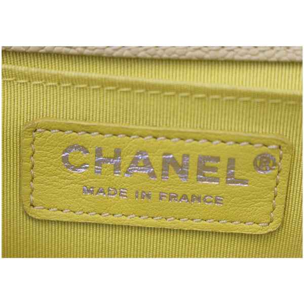 Chanel Medium Boy Flap Bag Caviar Quilted Leather Yellow logo
