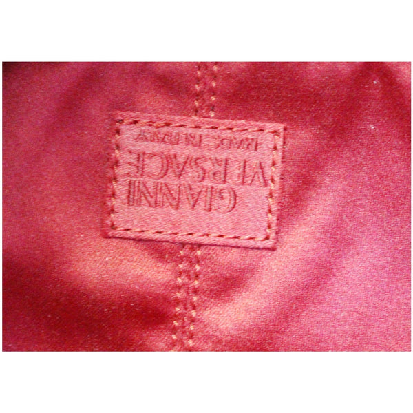 Versace Large Scale Embossed Leather Bag - logo