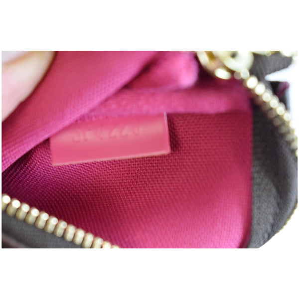 LOUIS VUITTON Mini Pochette Christmas Monogram Canvas Accessoires Pouch Brown