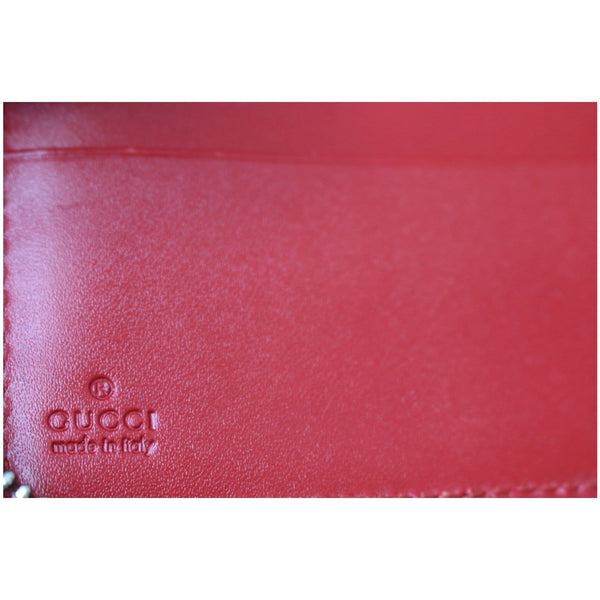 Gucci Signature Continental Guccissima hand clutch