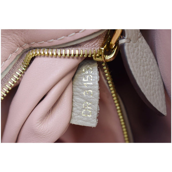 Louis Vuitton Tournon Taurillon Leather Hobo Bag Galet - item code DR3155