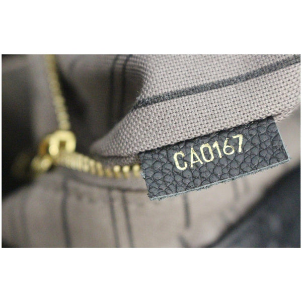 product code lv Artsy MM Empreinte Leather Bag