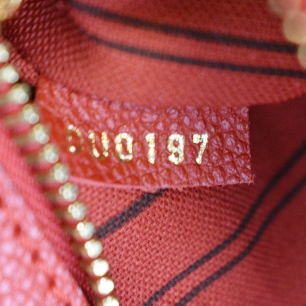 LOUIS VUITTON Metis Pochette Empreinte Leather Crossbody Bag Red