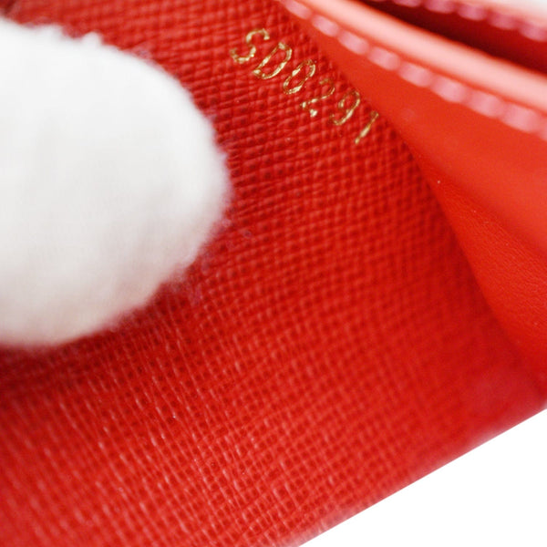 LOUIS VUITTON Clemence Monogram Canvas Zippy Wallet Brown