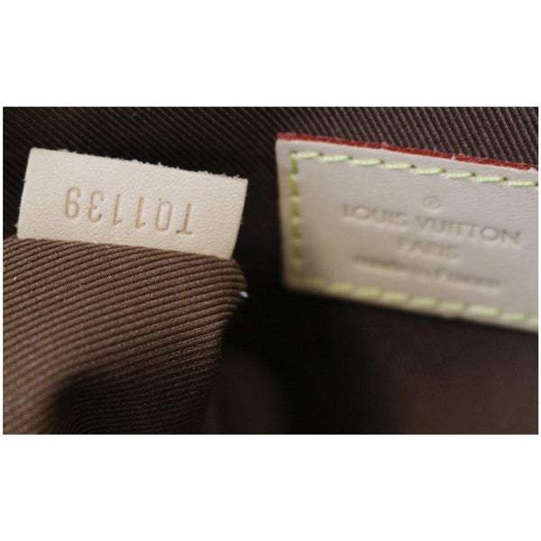LOUIS VUITTON Etui Voyage PM Monogram Canvas Pouch Brown