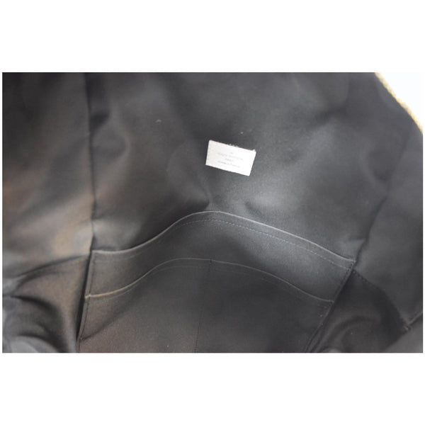 LOUIS VUITTON Discovery PM Taiga Monogram Leather Backpack White