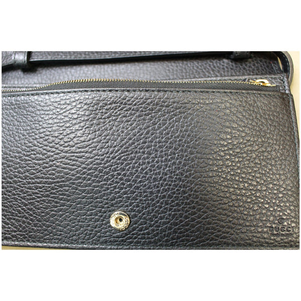 Gucci Textured Leather Swing Crossbody Clutch - Women