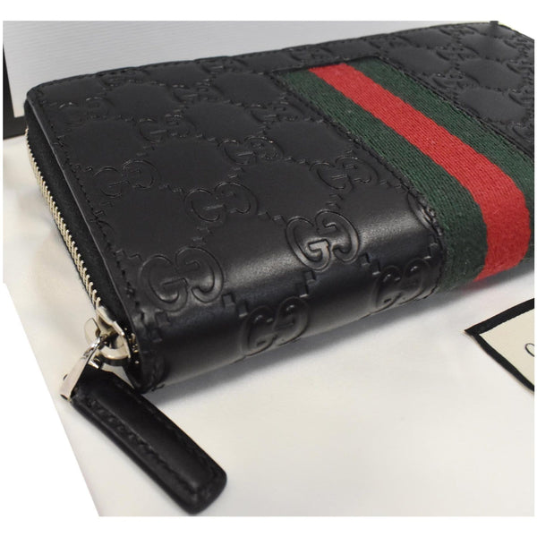 preloved Gucci Web Guccissima Leather Zip Around Clutch