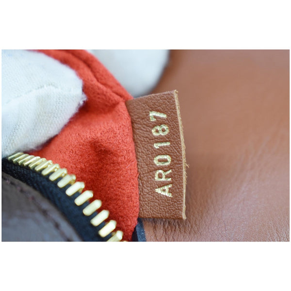 Louis Vuitton Tuileries Monogram Canvas Hobo Bag code