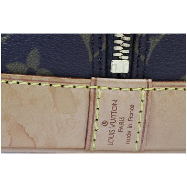 Louis Vuitton Alma Monogram Canvas Satchel Bag Brown logo view