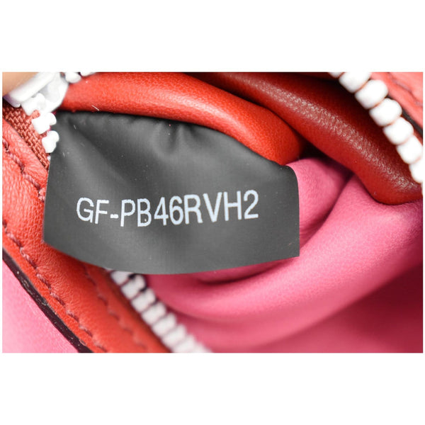 Valentino Free Rockstud Spike Leather Belt Bag code tag