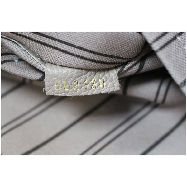 LOUIS VUITTON Melie Empreinte Leather Hobo Bag Beige