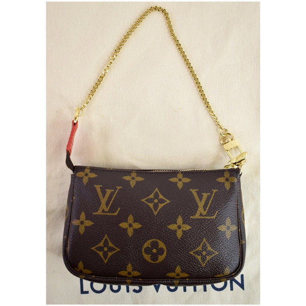 LOUIS VUITTON Mini Pochette Christmas Monogram Canvas Accessoires Pouch Brown