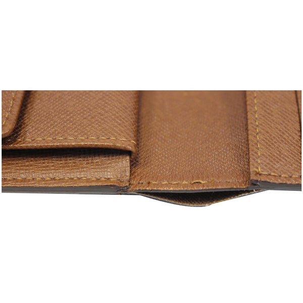 LOUIS VUITTON Porte Tresor International Monogram Canvas Wallet Brown