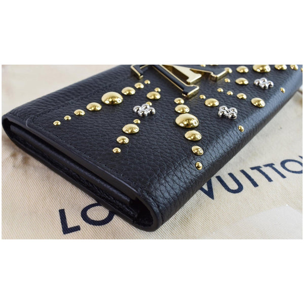 authentic Lv Capucines Studded Leather Wallet Black