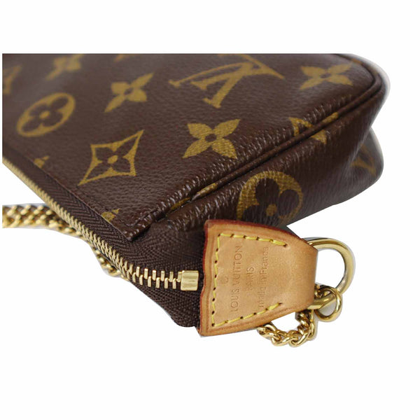 LV Mini Pochette Monogram Canvas Pouch item tag