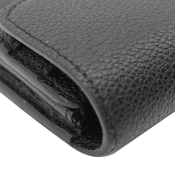 LOUIS VUITTON Sarah Monogram Empreinte Leather Wallet Black