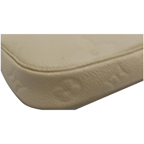 LOUIS VUITTON Multi Pochette Accessories Empreinte Bag Cream