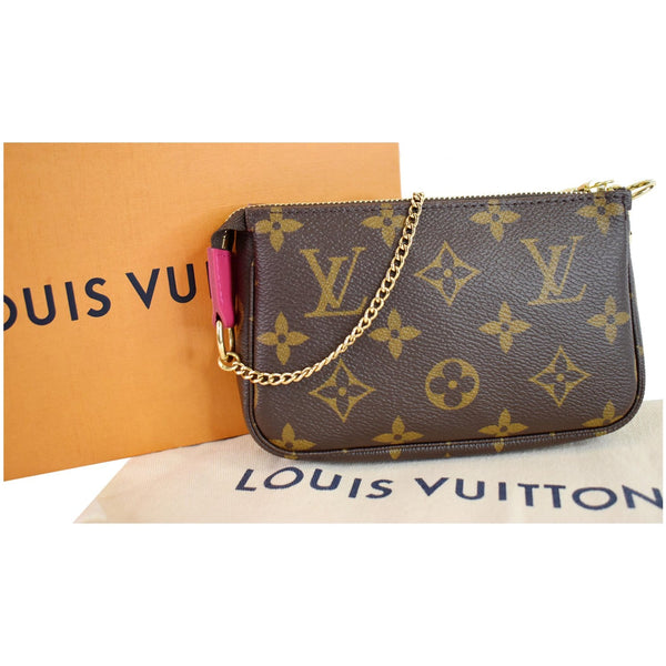 LOUIS VUITTON Mini Pochette Christmas Monogram Canvas Accessoires Pouch Brown