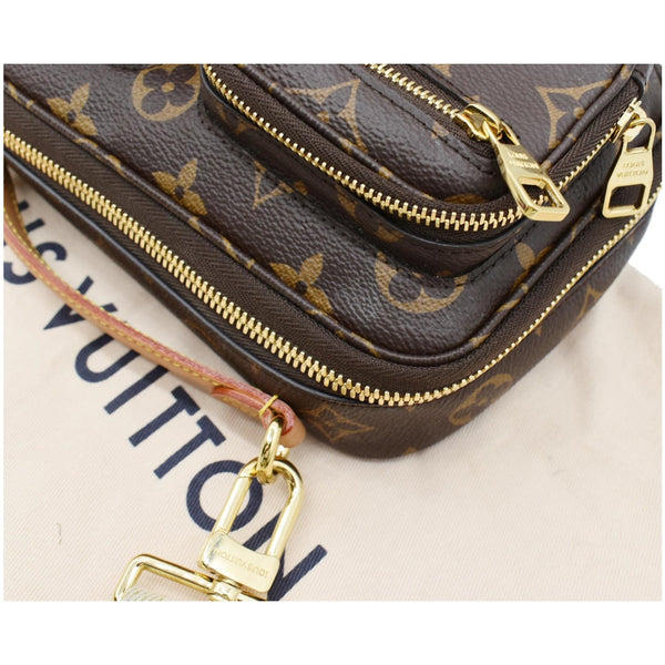 LOUIS VUITTON Utility Monogram Canvas Crossbody Bag Brown