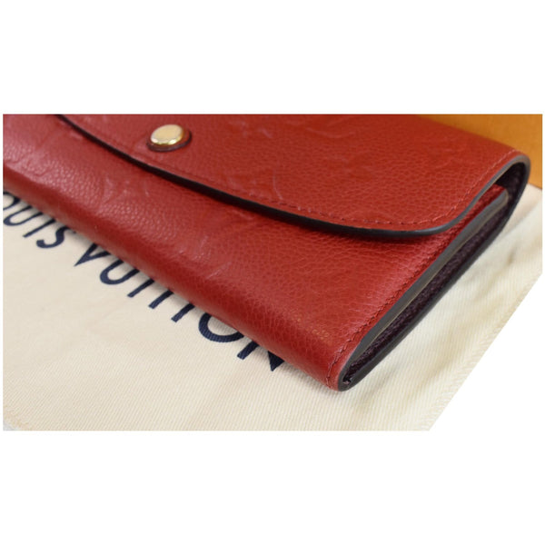 LOUIS VUITTON Emilie Monogram Empreinte Leather Wallet Red