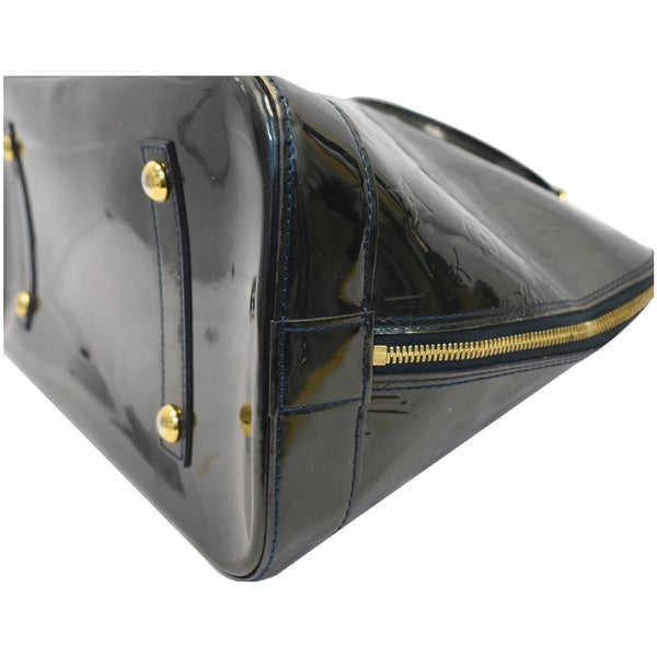 Louis Vuitton Alma Large GM Satchel Bag bottom feet