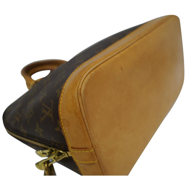 LOUIS VUITTON Alma Monogram Canvas Satchel Bag Brown