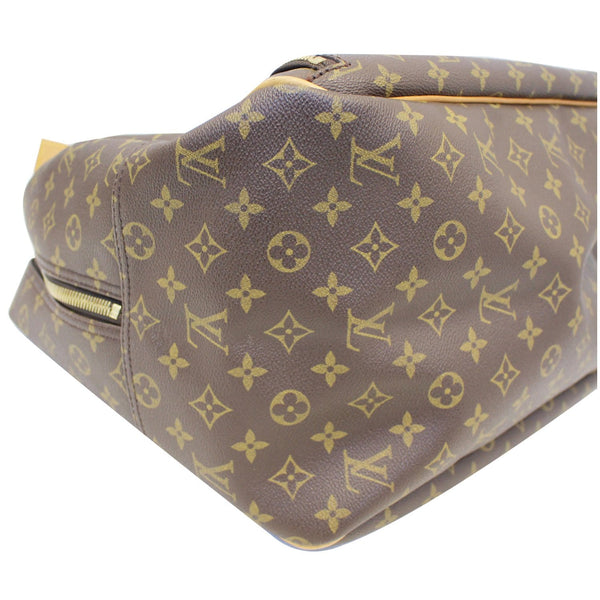Louis Vuitton Evasion Monogram Canvas travel Bag - side look