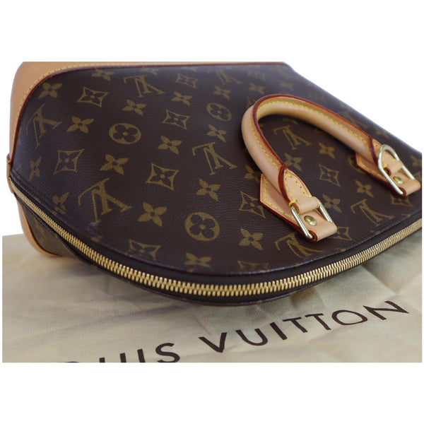 Louis Vuitton Alma Monogram Canvas Satchel Handbag top bag look