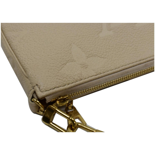 LOUIS VUITTON Multi Pochette Accessories Empreinte Bag Cream