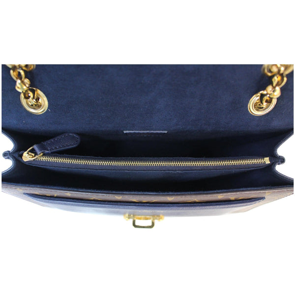 Elegant Interior Louis Vuitton Victoire Monogram Canvas Bag
