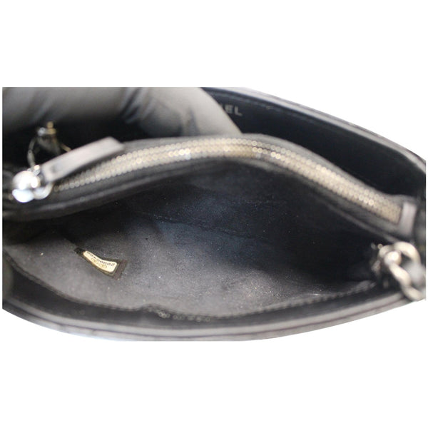 Chanel Reissue Lucky Charm Quilted Leather Bag top inner look