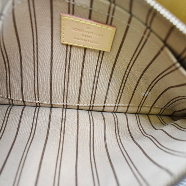 LOUIS VUITTON Neverfull Monogram Canvas Pochette Wristlet Pouch Brown